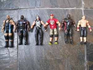 WWE LOTTO DI 6 FIGURINE CTION LOTTO DI 6 ESTREMAMENTE RARE - Foto 1 di 10