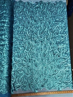 Matte Turquoise Curly Sequin Fabric on Poly Mesh "The Spiral Sequin" - BTY  - Image 1 of 4