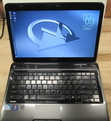 Toshiba Satellite L645-S4038 Core i3 14" Laptop Computer - MX Linux - Image 1 of 4