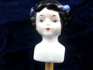 Vintage Porcelain Doll Head Part Black Hair Blue Bows on Stick 2.7" - Picture 1 of 5