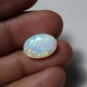 5.1 Cts 15.2x10.6 MM Natural AAA Green Red Blue Fire Ethiopian Opal Oval Cut - Picture 1 of 9