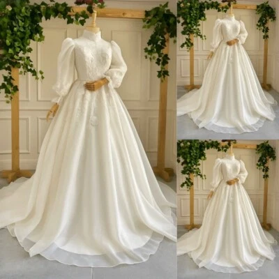 Vestidos de novia musulmanes de gasa cuello alto mangas largas línea A elegante vestido de novia Foto 1 de 4