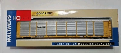 Walthers HO Scale Thrall 89' Tri-Level Auto Carrier #TTX-710380 Gold Line - Image 1 of 4