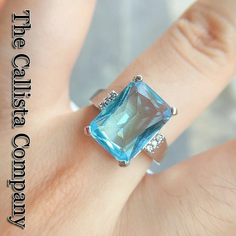 THE CALLISTA CO. CREADO EN LABORATORIO 6,0 CT CORTE ESMERALDA AZUL CIELO 5A+ CIRCONITA PLATEADA RG TALLA 5-9 Foto 1 de 4