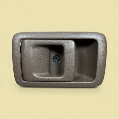 Manija de puerta interior lateral izquierdo Toyota 4Runner 1998-2002 marrón OEM Foto 1 de 4