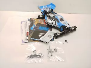 NUOVO: Team Associated RB10 1/10 2WD Buggy Roller Slider Chassis con servo e carrozzeria! - Foto 1 di 14