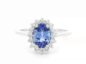 1.09 Carat Oval Tanzanite With Diamond Halo In 18k Gold. - Picture 1 of 4