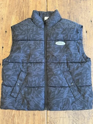 Chaleco acolchado No Fear x H&M cremallera completa talla L-XL negro estampado años 90 revive Y2K Foto 1 de 4