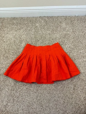 Linda Falda Preppy Patinadora Acampanada Plisada Urban Outfitters Naranja Talla Pequeña Foto 1 de 4