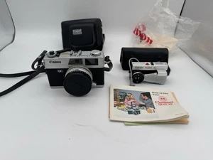 Macchina fotografica vintage Canonet QL17 a telemetro con flash Canon V3 e custodia non testata - Foto 1 di 5