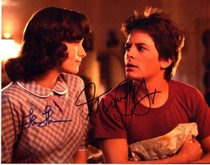 Foto firmada por Michael J Fox Lea Thompson 11x14 foto autografiada con certificado de autenticidad - Imagen 1 de 1