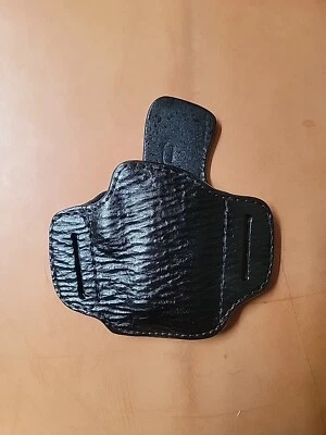 FUNDA TRIPLE K #779 THE SHARK CUERO PIEL DE TIBURÓN SE ADAPTA A M&P 9 SHIELD, SPRGFLD XDS Foto 1 de 3