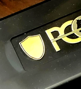 RARO ESPECIAL ⛨ Escudo Dorado ⛨ VARIEDAD Caja Negra Almacenamiento 20 Monedas ¡SIN PEGATINAS! - Imagen 1 de 3
