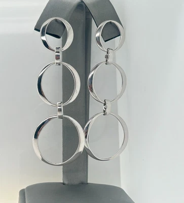 Pendientes colgantes largos circulares de oro de 14k Foto 1 de 4