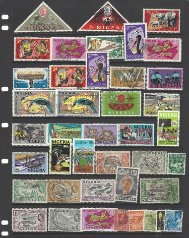 GREAT SELECTION OF NIGERIA STAMPS IN BLACK STOCK PAGE Cover