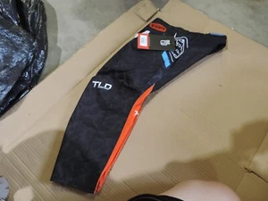 Troy Lee Designs Youth GP pants Black/orange size 24 - Picture 1 of 7