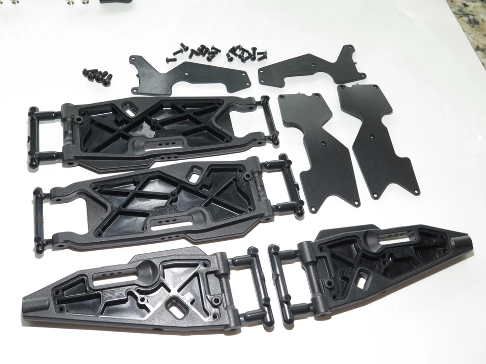 MUGE2029 MUGEN SEIKI MBX8TR 1/8 TRUGGY FRONT REAR A-ARMS - Image 1 of 1
