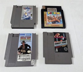 T-124 VINTAGE NINTENDO NES LOT TOP GUN, TOOBIN, DONKEY KONG, INDIANA JONES