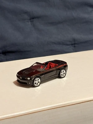 1:64 Scale 2013 Chevrolet Camaro ZL1 Convertible - Black / Red Interior - Image 1 of 4