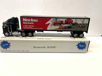 New Idea Hay Tools Kenworth K100 with Bank Trailer 1/64th Scale Speccast Truck - Image 1 of 4