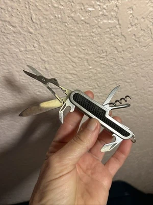 Navaja de bolsillo plegable vintage de 7 herramientas con agarre de goma de acero inoxidable sin marca Foto 1 de 4