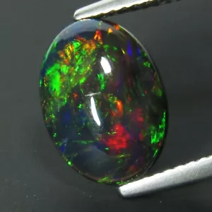 2.04Cts Natural Color Play Ethiopian Black Opal Oval Cabochon Loose Gem - Picture 1 of 3