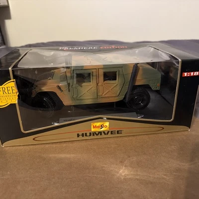 Maisto Premier Edition Humvee SUV 1:18 Hard Top camo - Image 1 of 4