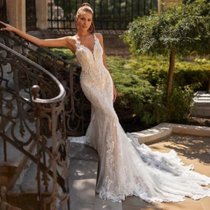 Abiti da sposa a sirena in pizzo scollo a V perline applicazioni bottoni schiena abiti da sposa - Foto 1 di 8
