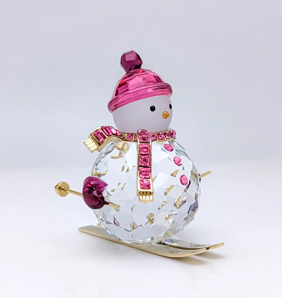 - SWAROVSKI Holiday Cheers Snowman Pink Skis Figurine 5687121