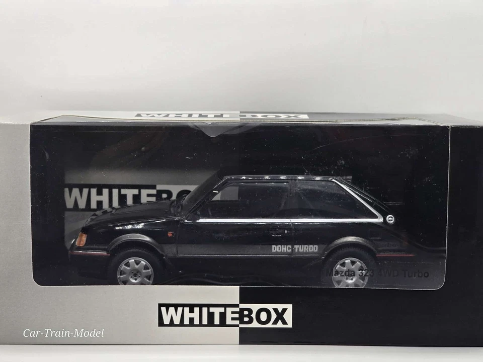 Die-CAST - Mazda 323 4WD Turbo - WhiteBox  1:24 1/24 1-24 - Immagine 1 di 1