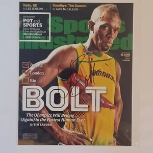 USAIN BOLT SIGNED 8X10 SPORTS ILLUSTRATED AUTOGRAPHED AUTO PHOTO OLYMPICS - Picture 1 of 2