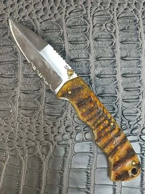 Ram Horn Handle Stainless Steel Serrated Spear Point Finger Assist Pocketknife - Image 1 of 4