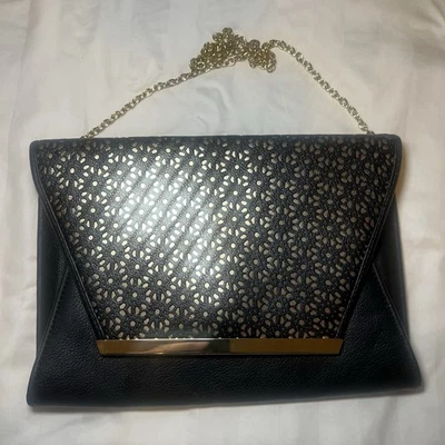 Bolso sin asas Jessica McClintock sobre negro y dorado Foto 1 de 4