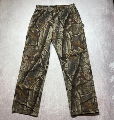 Pantalones de carpintero Carhartt camuflados de lona Realtree de maderas duras para hombre 33x32 peto jean Foto 1 de 4