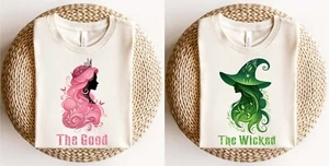 Elphaba Glinda The Good The Wicked Shirt, Wicked Musical Movie Merch, Defying Gr - Picture 1 of 4