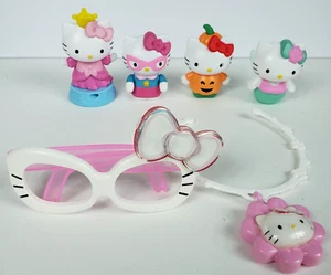 Lotto 6 occhiali da sole e collana McDonalds Hello Kitty Toys Happy Meal sirena - Foto 1 di 12