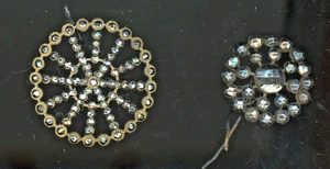 Two cut steel riveted buttons. - Picture 1 of 2