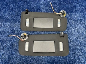 Juego de parasoles izquierdo derecho Cadillac CT6 16-20 con espejos retrovisores de tocador iluminados OEM - Imagen 1 de 8