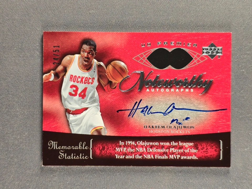 2007-08 UD Premier notable #NW-HO Hakeem Olajuwon/51 automático Houston Rockets Foto 1 de 4