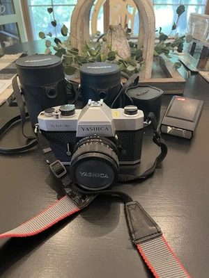 YASHICA TL-ELECTRO VINTAGE SLR 35mm CAMERA/w EXTRA (3) EXTRA LENSES  - Image 1 of 4