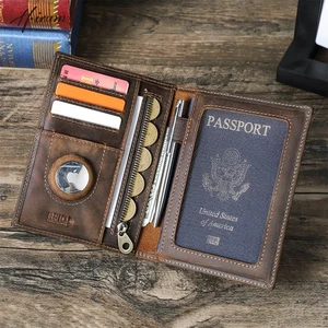Portafoglio da viaggio porta passaporto in vera pelle di mucca con custodia Airtag blocco RFID - Foto 1 di 9