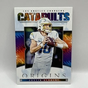 JUSTIN HERBERT 2022 ORIGINS FOOTBALL CATAPULTS CHARGERS #CAT-2 Q1787 - Picture 1 of 2