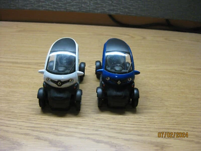 1/18  RENAULT TWIZY-ONE BLUE, ONE WHITE ,  NO BOX - Image 1 of 4