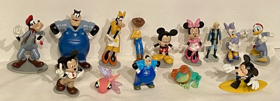 Lote de 14 figuras en su mayoría Disney vintage y actuales de Mickey, Woody, Donald, etc. Foto 1 de 4