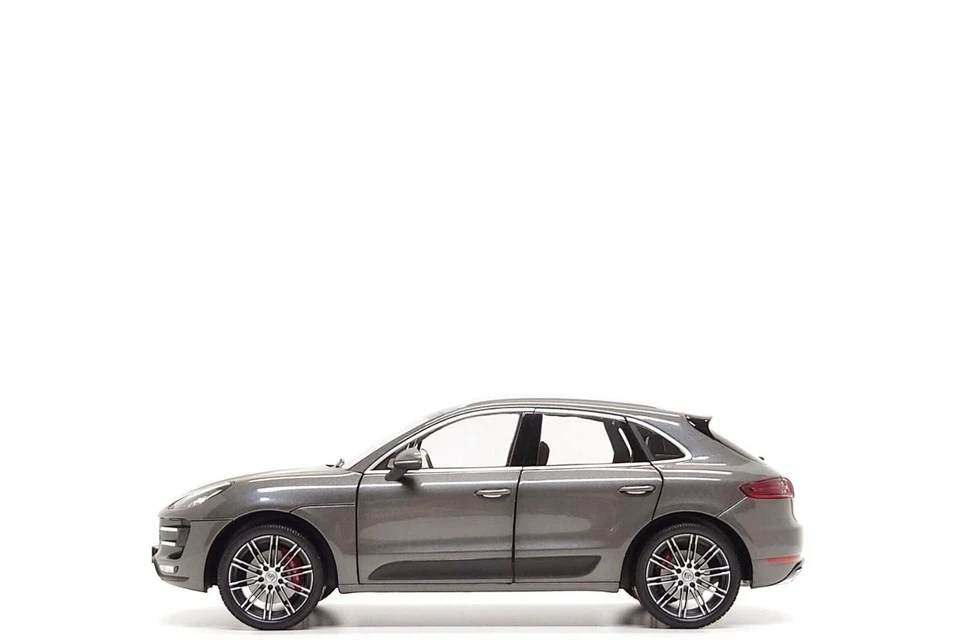 Minichamps 1:18 Porsche Macan Turbo in Agate Grey Metallic - Image 1 of 4