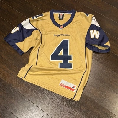 Camiseta Winnipeg Blue Bombers #4 para hombre talla S Reebok dorada alternativa CFL en blanco leer Foto 1 de 4