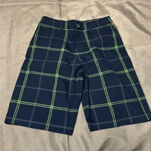 Pantalones Cortos Under Armour Azul y Verde a Cuadros Estilo Informal - Imagen 1 de 3