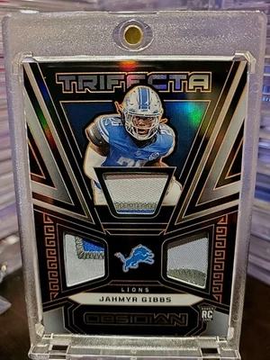 2023 Obsidian Trifecta Jahmyr Gibbs Patches #TRI-JGI Orange Electric Etch /49 RC - Image 1 of 4