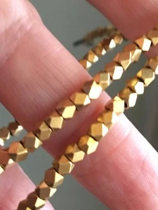 Perline in ottone grezzo taglio diamantato lucido 3 mm, filo 16", circa 140 perline - Foto 1 di 4