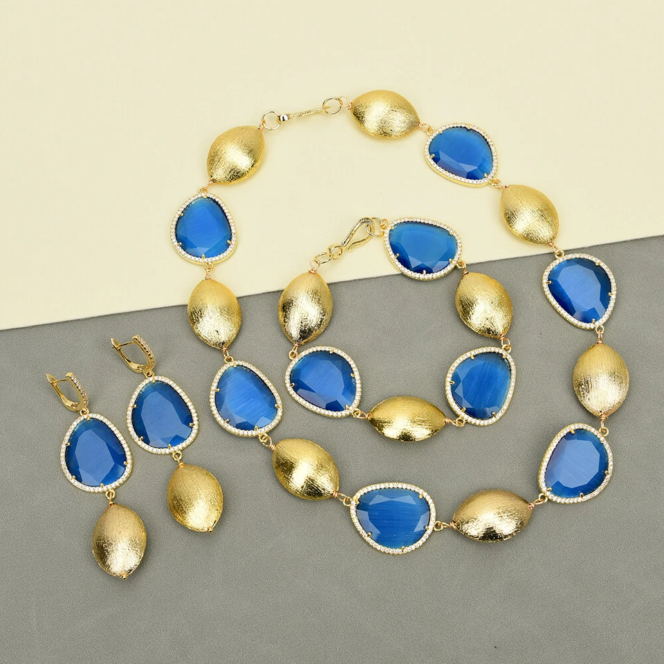 Conjuntos de aretes collar de cuentas cepilladas chapado en oro pavimentado circonita cúbica de cristal azul Foto 1 de 1